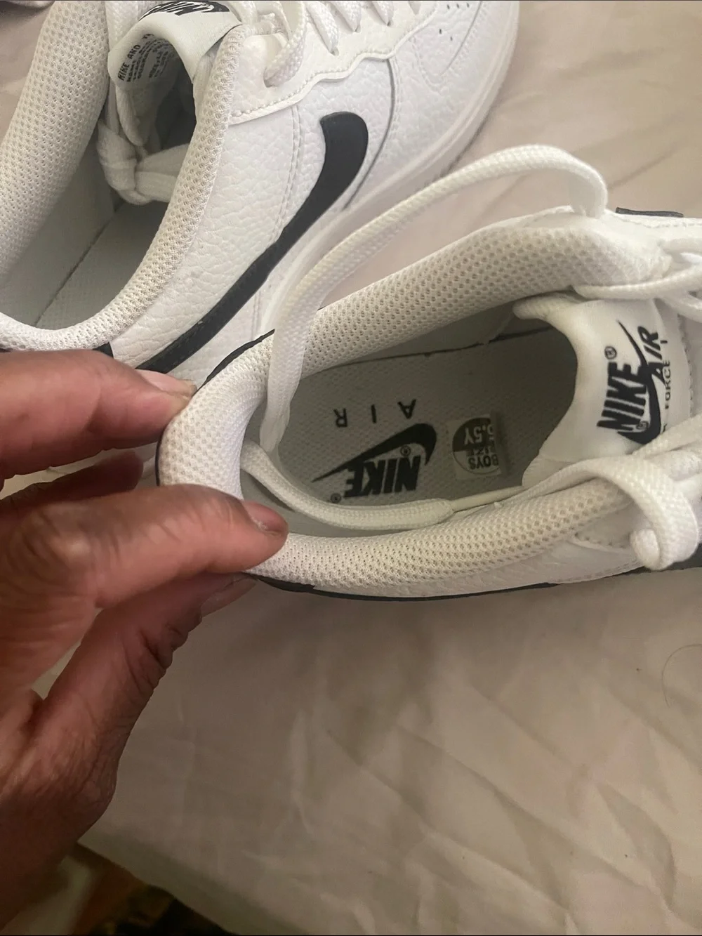 Nike White Low-Top Sneakers with Black Logo